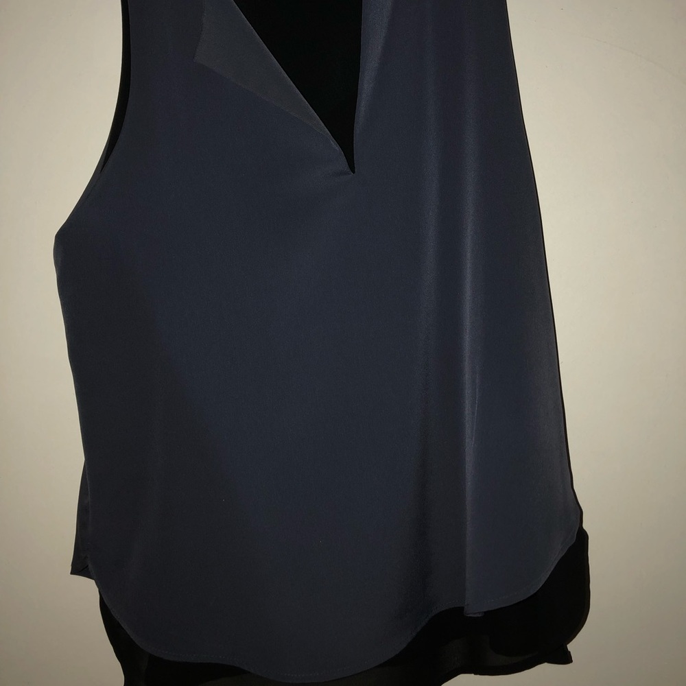 Sleeveless shirt blue with black shear underneath